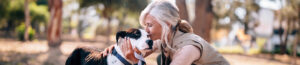 Senior woman with rescue dog.