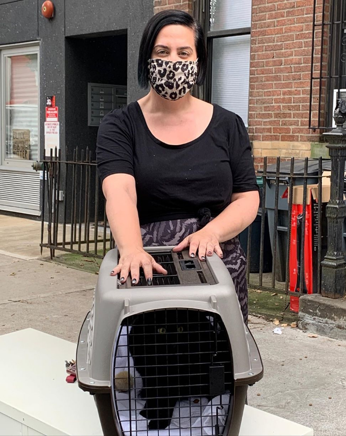beth-blog-oct2020-uncle-jake-adopted a woman wearing a mask and holding a kennel