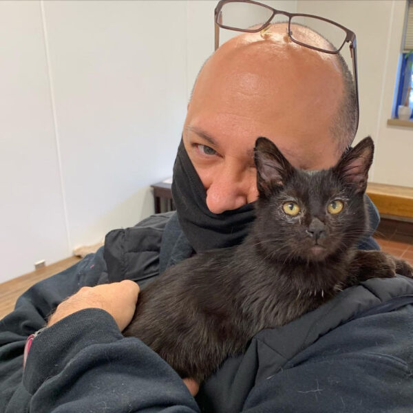 beth-blog-dec2020-richmond-adopter a man holding a cat