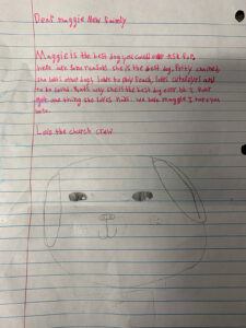 a paper with a drawing of a dog