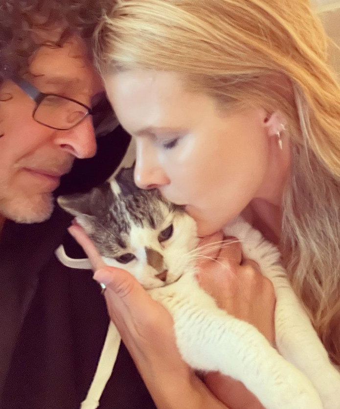 beth-blog-april2022-howard-beth-walter a man and woman holding a cat