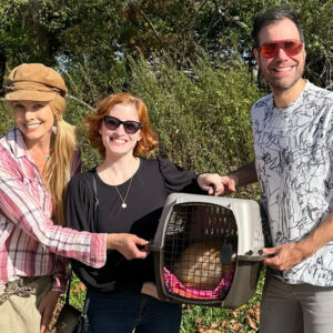 beth-blog-lolavie2 a group of people holding a pet carrier