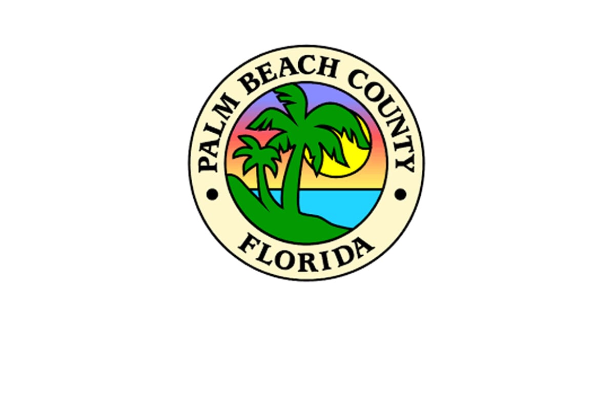 a logo of a palm tree and sun