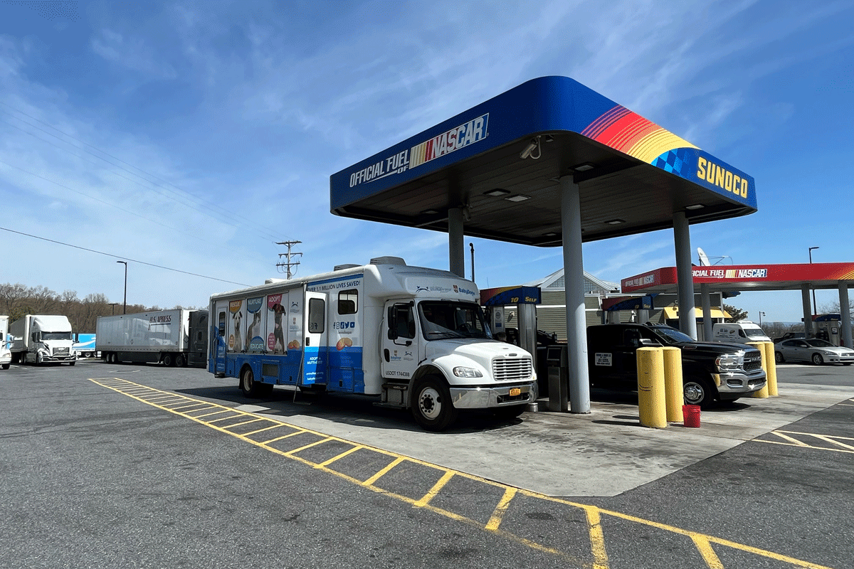 a truck at a gas station
