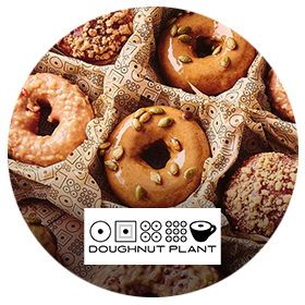 a group of donuts in a basket
